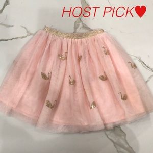 Cute pink skirt with golden sequen swans